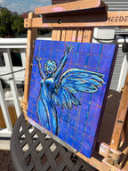 Sketch of a stone angel from Brooklyn's Green-Wood Cemetery posed with her arms open to the sky in exultation, on a purple mixed media background that has a grid-like pattern including blues, pinks, yellows, and oranges.